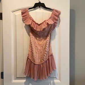 Fitted. On the short side. Lined. Never worn